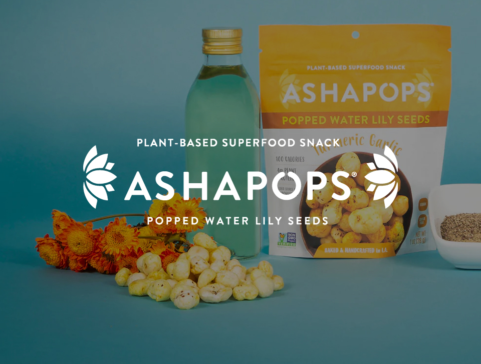 ShippingEasy user, AshaPops, white logo overlayed on photo of their products displayed on blue background